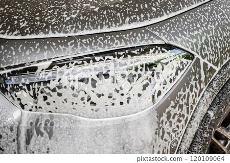 car cleaning and washing with foam soap 120109064