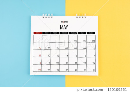 May 2025 calendar on blue and yellow color background. May 2025 calendar on blue and yellow color background. 120109261
