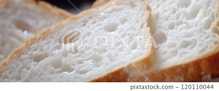 Close up of fluffy white bread slices, toasted edges, food background 120110044