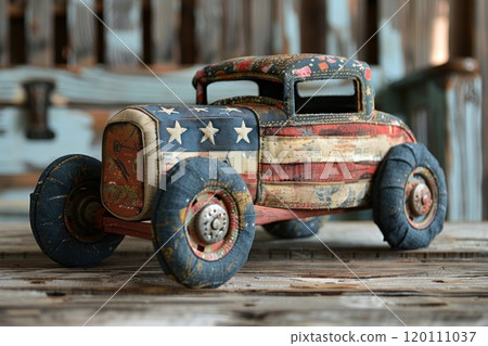 Rustic patriotic retro toy car with American flag design on wooden background Rustic patriotic retro toy car with American flag design on wooden background 120111037