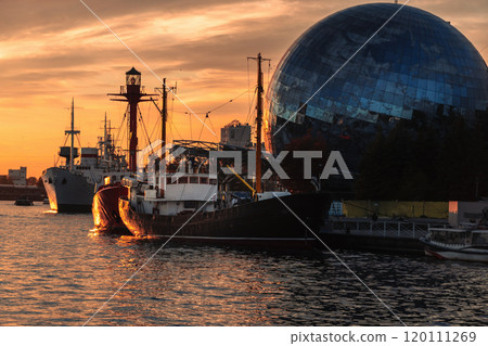 Pregolya River and ships in Kaliningrad at sunset. Russia Pregolya River and ships in Kaliningrad at sunset. Russia 120111269