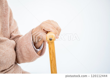 Aged hand with cane Aged hand with cane 120112444
