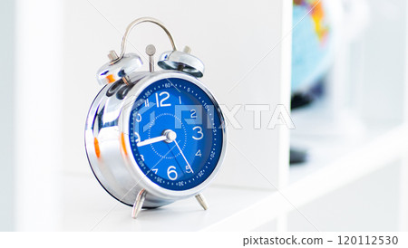 Analog alarm clock with blue face Analog alarm clock with blue face 120112530
