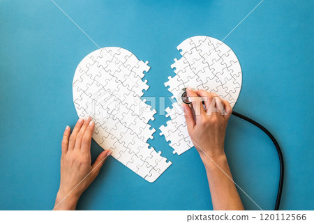 White puzzle in heart shape White puzzle in heart shape 120112566