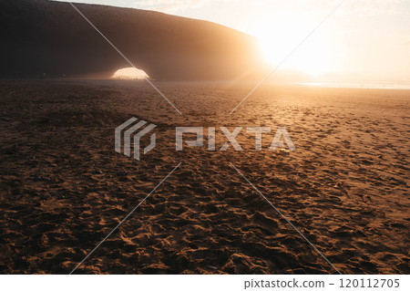 Huge rocks and sunset at Legzira Beach in Morocco 120112705