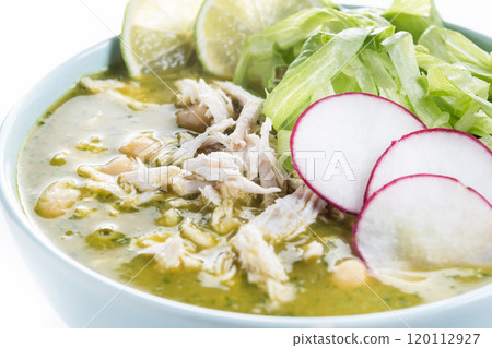 Traditional mexican green pozole soup isolated on white background 120112927