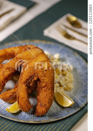 Traditional Christmas dinner in Czech Republic - fried carp with potato salad Traditional Christmas dinner in Czech Republic - fried carp with potato salad 120113865