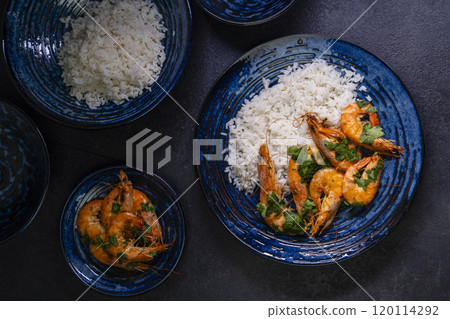 fried shrimp with plain rice on plate 120114292
