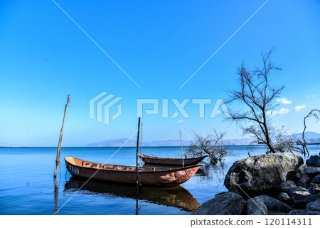 Beautiful beach with fishing boats there Beautiful beach with fishing boats there 120114311