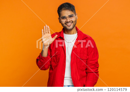 Happy man smiling friendly waving hands gesturing hello greeting or goodbye, meeting invitation Happy man smiling friendly waving hands gesturing hello greeting or goodbye, meeting invitation 120114579