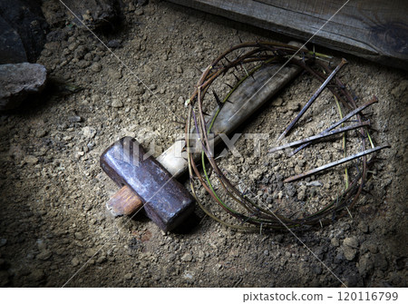 Rusty nails and a wreath of thorns at the cross 120116799