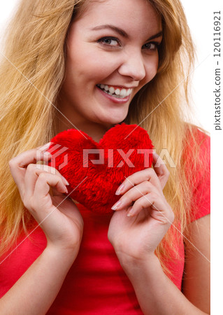 Woman blonde girl holding red heart love symbol Woman blonde girl holding red heart love symbol 120116921