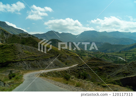 View from the car of an asphalt road in the mountainous area of Dagestan 120117313
