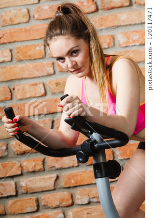 Active woman doing sport biking. Active woman doing sport biking. 120117471
