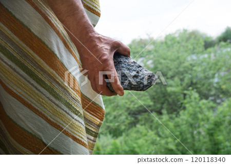Male hand with big stone Male hand with big stone 120118340