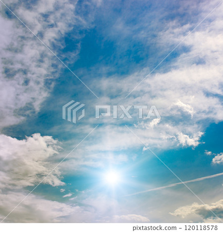 Beautiful cirrus clouds and sun against the blue sky. Beautiful cirrus clouds and sun against the blue sky. 120118578