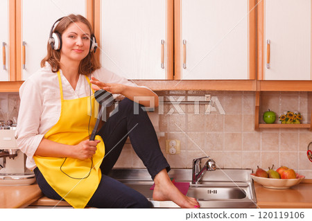 Happy housewife at home 120119106