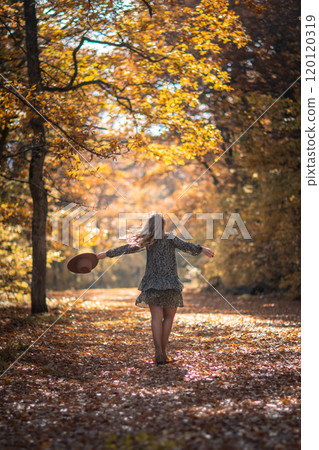 Woman Autumn Forest Walking Leaves Path Sunlight 120120319