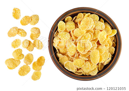 Cornflakes in ceramic bowl isolated on white background. Top view. Flat lay 120121035