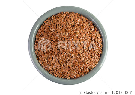 flaxseed in ceramic bowl isolated on white background. Top view. Flat lay 120121067