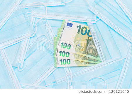 Euro Banknotes with Blue Disposable Medical Face Masks Euro Banknotes with Blue Disposable Medical Face Masks 120121640
