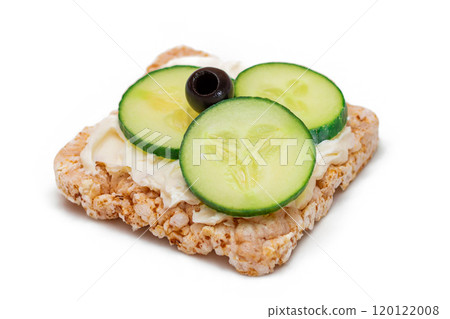 Rice Cake Sandwich with Fresh Cucumber, Cream Cheese and Olives - Isolated 120122008