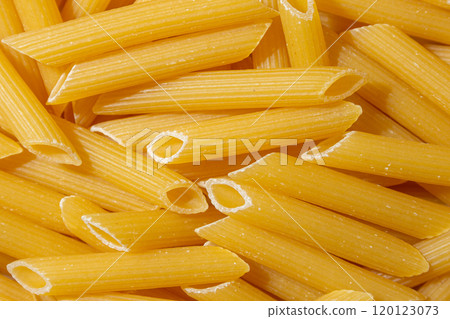 Uncooked Penne Rigate Pasta Background 120123073