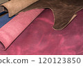 Pieces of natural calf leather with real texture. Leather craftsman's workshop. 120123850
