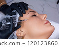 A beautician gives a woman a Botox injection. A procedure for beauty and rejuvenation. 120123860