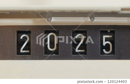 Year 2025 on a mechanical counter of gas meter 120124403