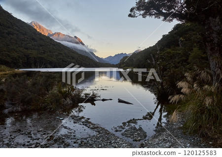 Scenic mountain lakeside landscape in New Zealand 120125583