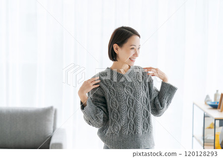 Middle woman relaxing in the room Middle woman relaxing in the room 120128293