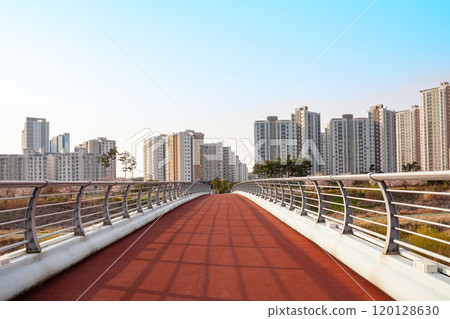 a jogging track on a bridge a jogging track on a bridge 120128630