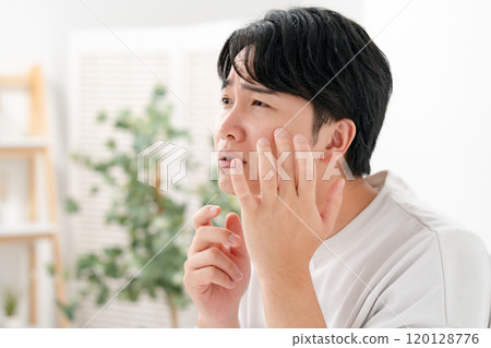 Men who suffer from skin problems 120128776