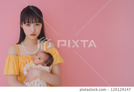 A natural portrait of an Asian baby and mother surrounded by love 120129147