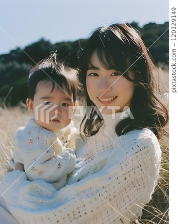 A natural portrait of an Asian baby and mother surrounded by love A natural portrait of an Asian baby and mother surrounded by love 120129149