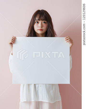 Asian woman holding a whiteboard 120129606