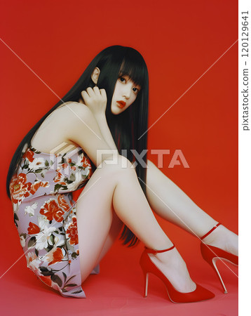 A moment of modern glamour: an Asian woman in high heels 120129641
