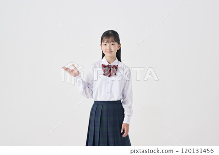 White background, Japanese female junior high school student giving a guide 120131456