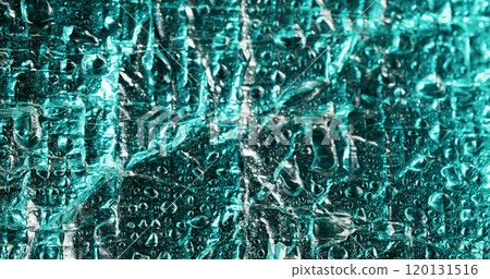 Color droplet. Flowing water. Dispersion on bubble film turquoise glossy surface. Condensation chaotic shimmering wetness cascade on deformed foil. Color droplet. Flowing water. Dispersion on bubble film turquoise glossy surface. Condensation chaotic shimmering wetness cascade on deformed foil. 120131516
