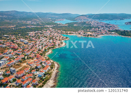 Islands in sea covered with lush greenery, aerial view. Rogoznica, Croatia Islands in sea covered with lush greenery, aerial view. Rogoznica, Croatia 120131740