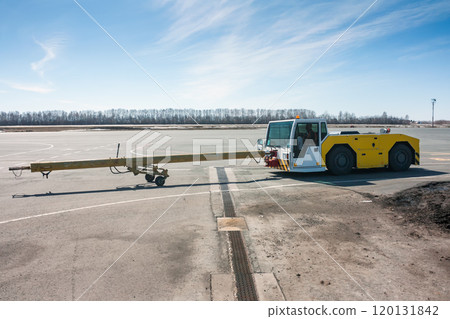 Aircraft tow truck with towbar on the airport apron Aircraft tow truck with towbar on the airport apron 120131842