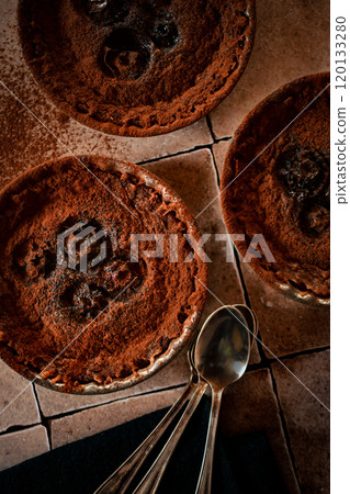 Chocolate candy on tiles Chocolate candy on tiles 120133280