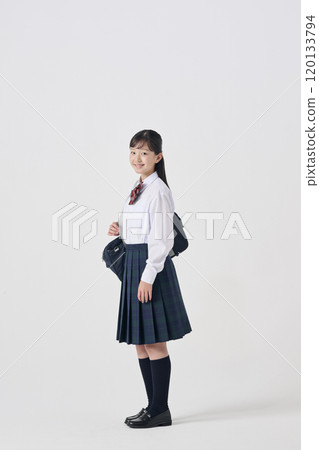 White background, Japanese female junior high school student with school bag 120133794