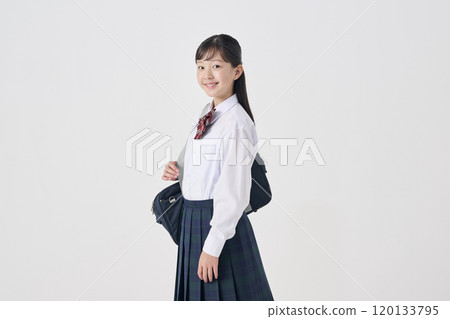 White background, Japanese female junior high school student with school bag 120133795