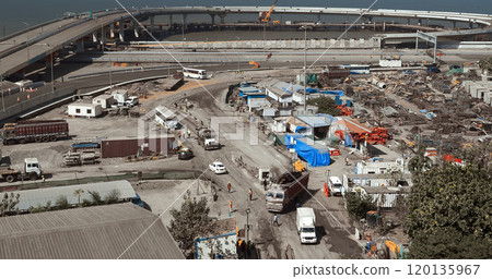 Truck Brought Metal Structures For Construction Of Highway. Aerial View Of Highway Construction Site. People At Work. , , . Construction Of New Highway Is Underway. Construction Of New Road Roundabout 120135967