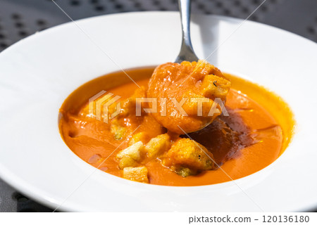 Creamy tomato soup or bisque with croutons, delicious rich smooth texture, perfect healthy lunch 120136180