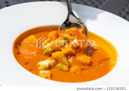 Creamy tomato soup or bisque with croutons, delicious rich smooth texture, perfect healthy lunch 120136181