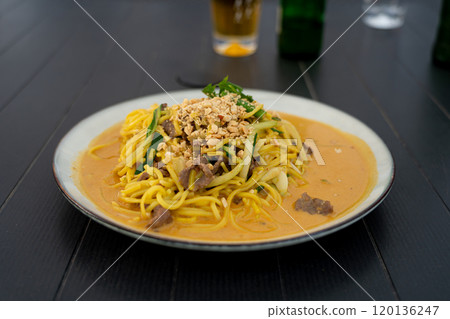 Chiang mai curry noodles, asian spicy egg pasta with meat, curried noodle soup Khao Soi or Khao Sawy, thai?food Chiang mai curry noodles, asian spicy egg pasta with meat, curried noodle soup Khao Soi or Khao Sawy, thai?food 120136247