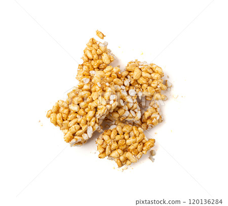 Puffed rice bar isolated, sweet wheat kozinaki, puff cereal block pieces, sugar crispy wheat bar, healthy popped dessert 120136284